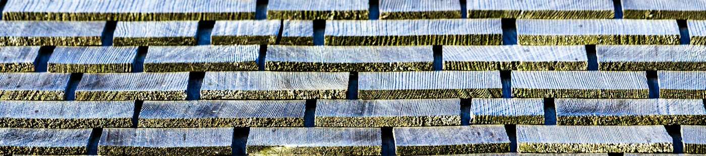 Hand-split cedar shakes with deep shadow lines