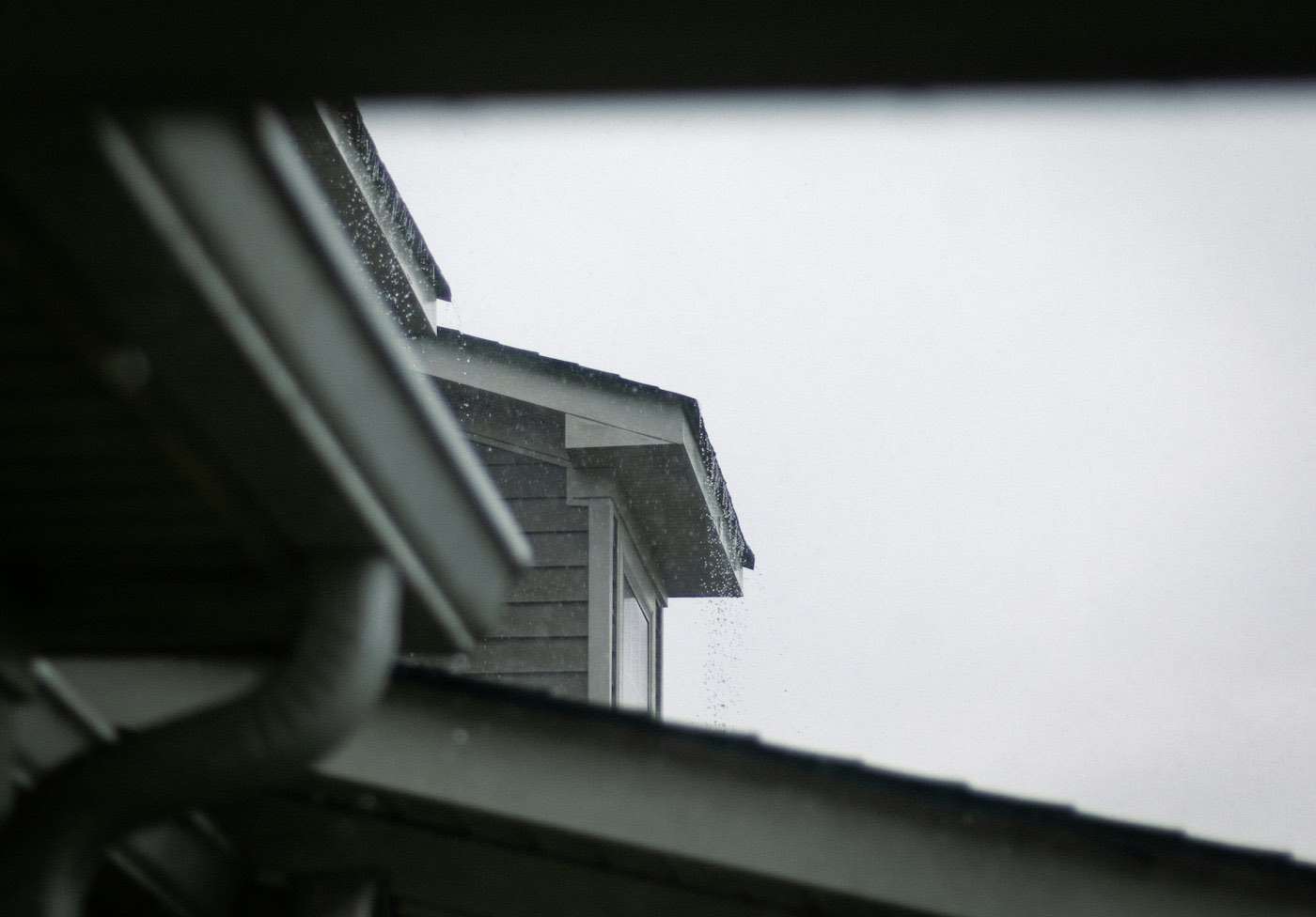 Eavestrough and fascia detail at a roof corner